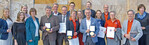Gruppenbild zum Staatsehrenpreis mit Ministerin Priska Hinz und Regierungspräsidentin Brigitte Lindscheid.